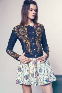 Woman in denim jacket and skirt
